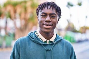 African american man smiling confident standing at street