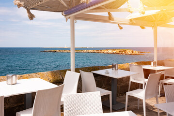 Small outdoor cafe on seaside in Italy in summer