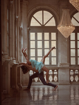Anonymous artist and graceful ballerina dancing in cathedral