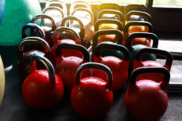 Naklejka na ściany i meble Close up many type of The kettlebells or dumbbell weighing at gym fitness, Many Kettlebells dumbbell available service in gym fitness