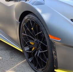 Closeup of grey sports car unbranded. 