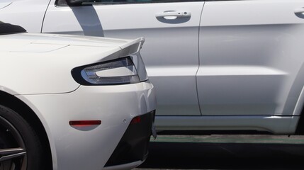 Closeup of rear on white generic car background image. 