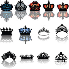 Obraz premium group of thirteen crowns with reflection on white