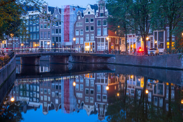 Morning Bridge and Reflections of Amsterdam Houses