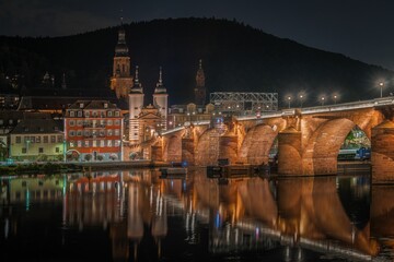 Fototapeta na wymiar Scenic night view of Heidelberg Old Bridge (Karl Theodor Bridge), Germany