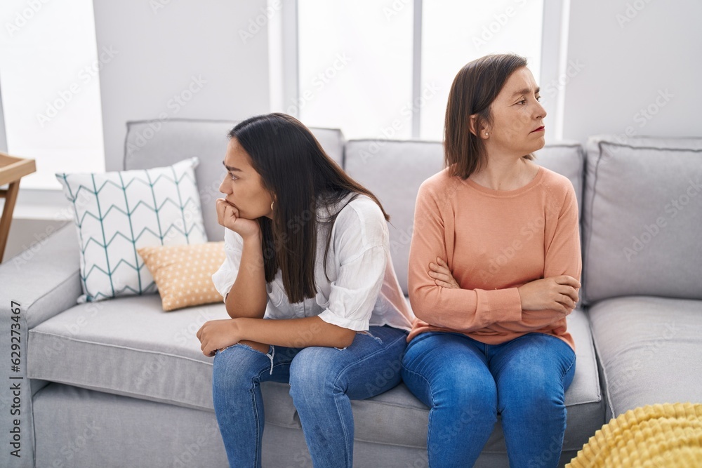 Wall mural two women mother and daughter arguing at home