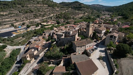Fototapeta na wymiar View of the Vallfonona de Riucorb castle and village in Spain as seen from a drone
