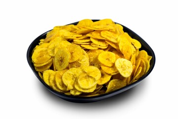 Close up of a bowl of freshly fried banana chips on a white background
