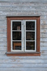 Obraz na płótnie Canvas Vertical of a window of a Helleren House in Jossingfjord, Norway