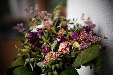 Closeup shot of a bouquet of wilting flowers.