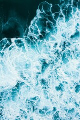 Aerial view of the wild and powerful waves of the sea in Burleigh Heads, Queensland