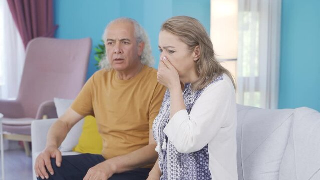 The couple who encountered a bad smell when they came home.