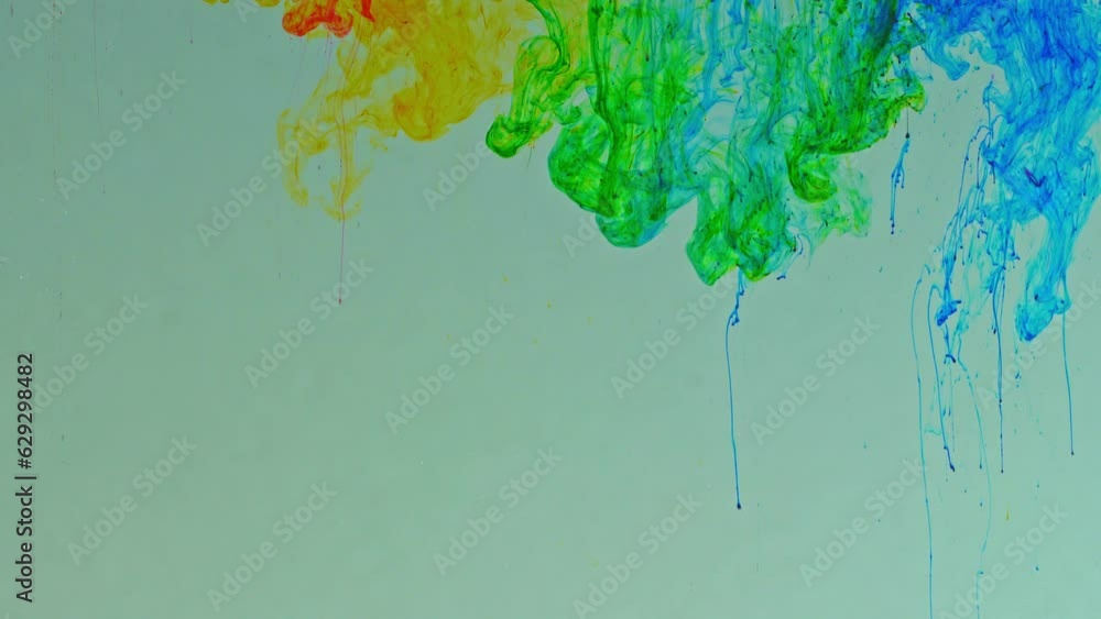 Poster colored powder flakes dissolved in water and spreads slowly when mixed with other colors to form new