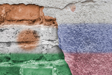 Niger and Russia. Russian and Nigerian flag. Flags of countries on background of a brick wall....