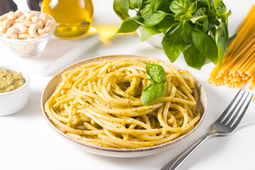 Spaghetti pasta with pesto sauce, basil, cashew and parmesan. Ingredients. 