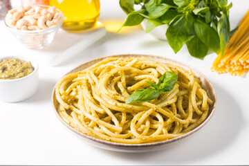 Spaghetti pasta with pesto sauce, basil, cashew and parmesan. Ingredients. 
