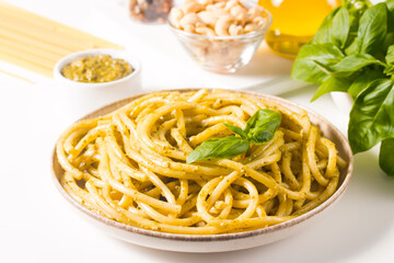 Spaghetti pasta with pesto sauce, basil, cashew and parmesan. Ingredients. 