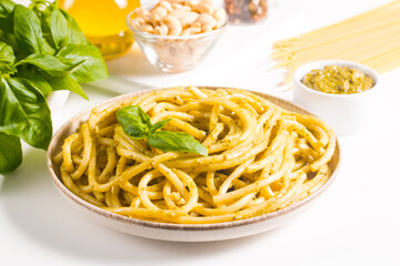 Spaghetti pasta with pesto sauce, basil, cashew and parmesan. Ingredients. 