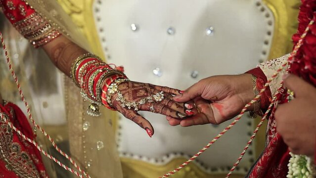 Indian Bride and Groom holding hand ritual, Hindu Wedding Concept, Bride and Groom Wedding Closeup