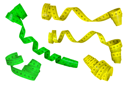 Measuring tape isolated on white background. A large set of measuring tapes of different colors folded into a spiral scatter in different directions. Green and yellow ribbons. Weight loss concept.