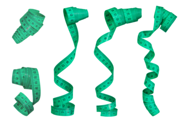 Measuring tape isolated on white background. A set of measuring tapes rolled into a spiral. Tapes for measuring dimensions or distances are green. The concept of weight loss or diet.