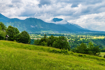 A view across the valley towards the village of Zasip near Bled, Slovenia in summertime