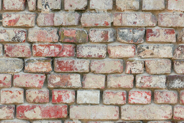 Zdjęcie przedstawiające teksturę utworzoną przez cegły ułożone w równych rzędach w murze....