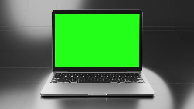 Notebook with green display for mockups on a futuristic metal backdrop.