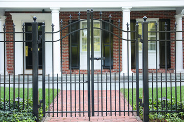 gates guard access, signifying boundaries, protection, and control. Barriers embrace both...