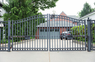 gates guard access, signifying boundaries, protection, and control. Barriers embrace both opportunity and restriction