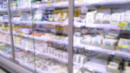 Abstract blur image of supermarket background. Defocused shelves. CPG products. Grocery shopping. Store. Retail industry. Food quality. Discount. Inflation and crisis concept. Aisle. Profitability