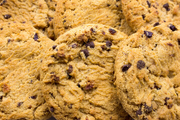 Wheat flour cookies with cherries and chocolate. Food background.