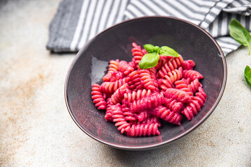 pink pasta beet sauce vegetable fusilli beetroo fresh food meal snack vegetarian food on the table copy space food background rustic top view