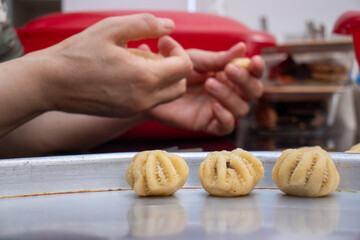 Obraz na płótnie Canvas Process of making arabic cookies and kahk for islamic eid after ramadan