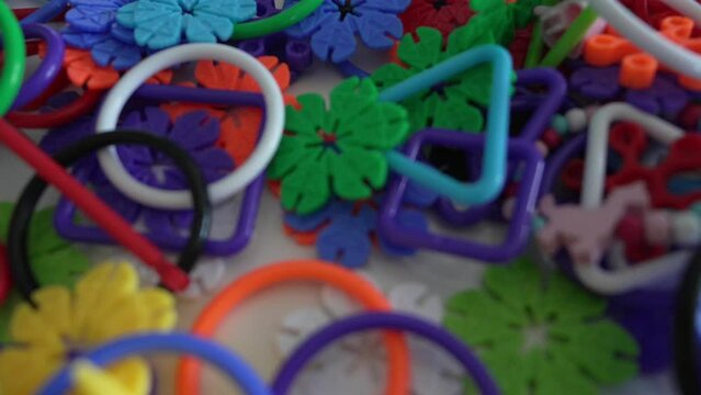 close up on plastic stack of interlocking assembly DIY toys