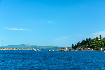 seascape during a voyage on a yacht in the Bay of Kotor, Montenegro, bright sunny day, mountains and sea, travel