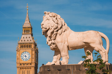 Big Ben, Westminster Bridge on River Thames in London, the UK. English symbol. Lovely puffy clouds,...