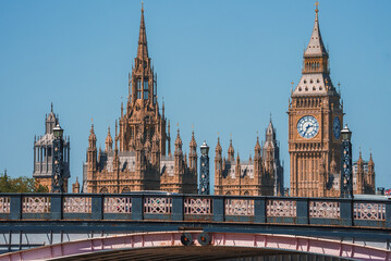 Big Ben, Westminster Bridge on River Thames in London, the UK. English symbol. Lovely puffy clouds,...