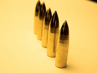 Close up picture of group of bullets shoot on an isolated background