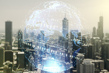 Multi exposure of abstract software development hologram and world map on Chicago skyscrapers background, global research and analytics concept