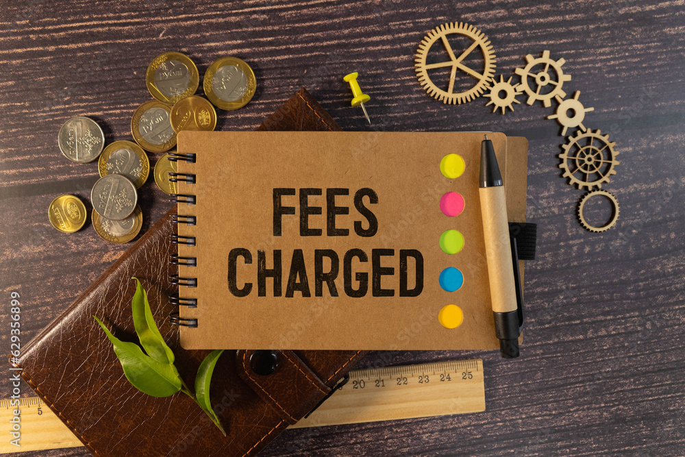 Poster fees charged text on notebook with clipboard and calculator on chart background