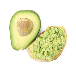 Delicious sandwich with guacamole and half of avocado on white background, top view