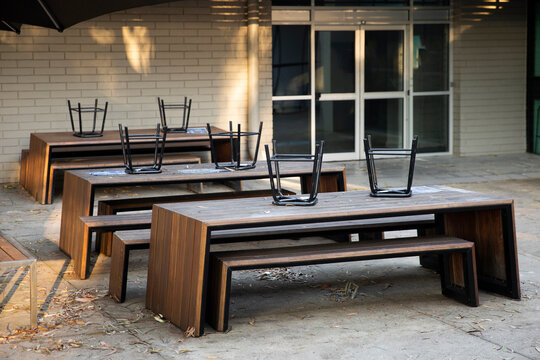Closed University Cafe with Stacked Modern Outdoor Timber Bench Seating
