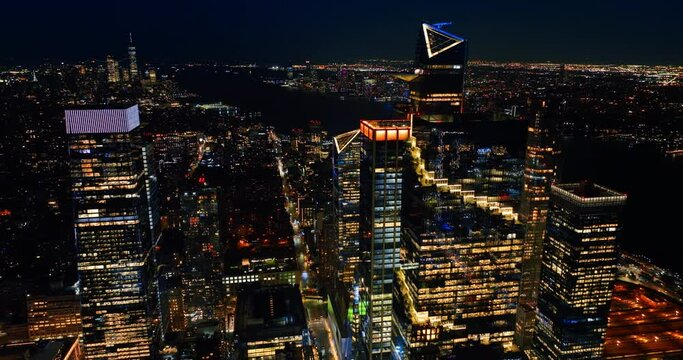 Rising above the splendid cityscape of New York. Night city view from drone footage.