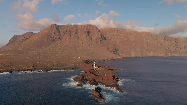 4K 60Fps Punta de Teno Lighthouse on the island of Tenerife, Canary Spain, one of the most touristic lighthouses on the island with the incredible sunset 01