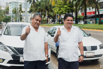 latin couple of taxi drivers men with car on background at city street in Mexico in Latin America,...