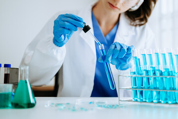 Modern medical research laboratory. female scientist working with micro pipettes analyzing biochemical samples, advanced science chemical laboratory for medicine. - obrazy, fototapety, plakaty
