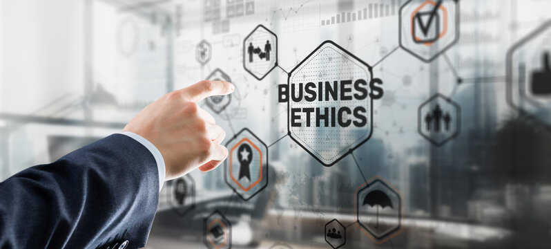 Business man writing business ethic concept on virtual screen
