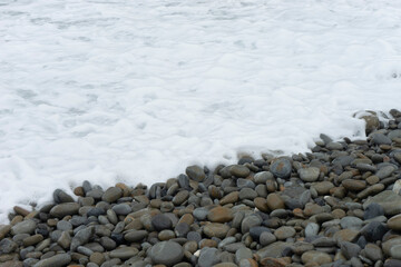 丸い石の音で知られる、奄美のホノホシ海岸。
