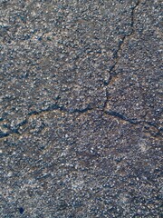 古びたコンクリートのひび割れのアップ